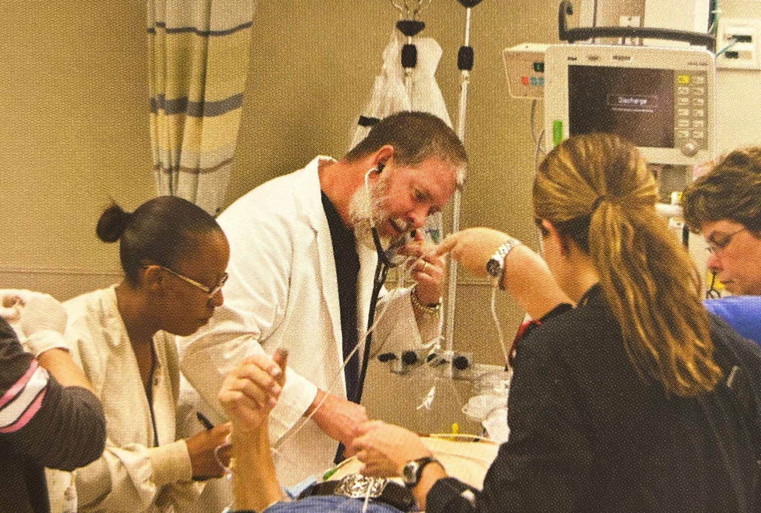 Faculty teaching at the bedside